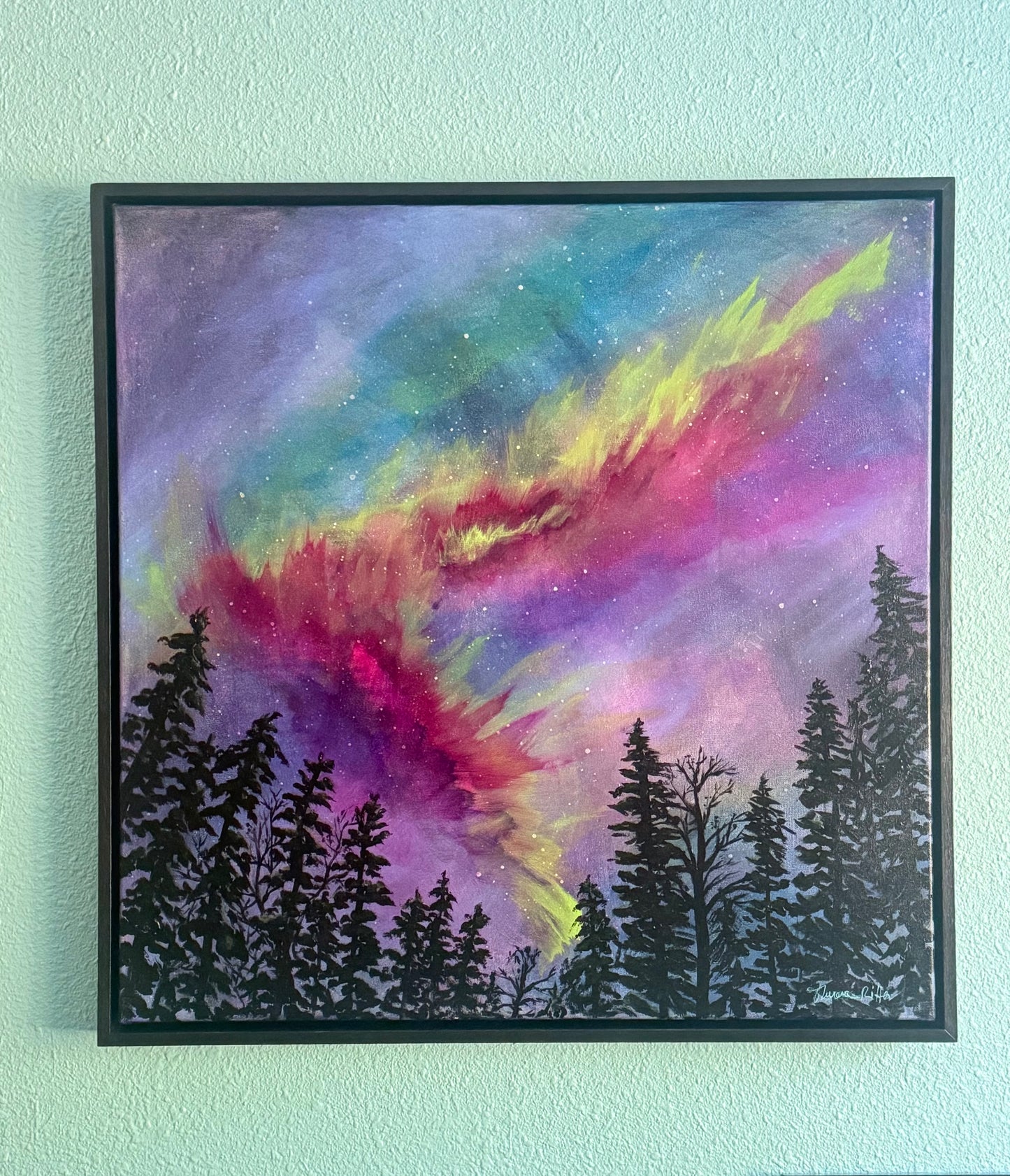 Painting showcasing a vivid aurora above a forest.