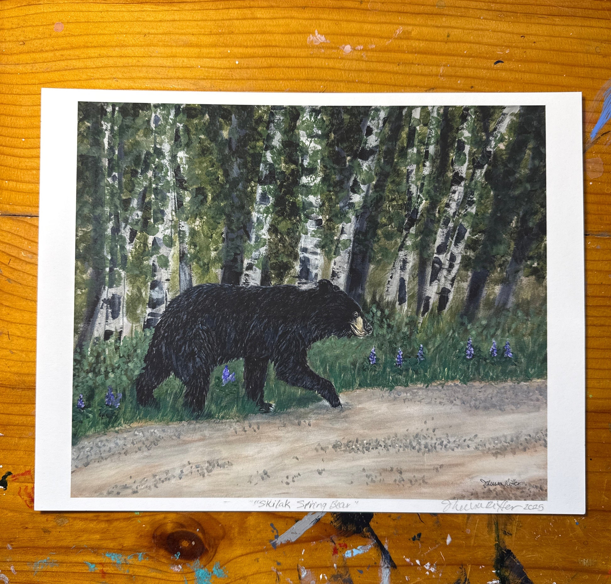 Art print of acrylic painting featurning a black bear crossing the road 