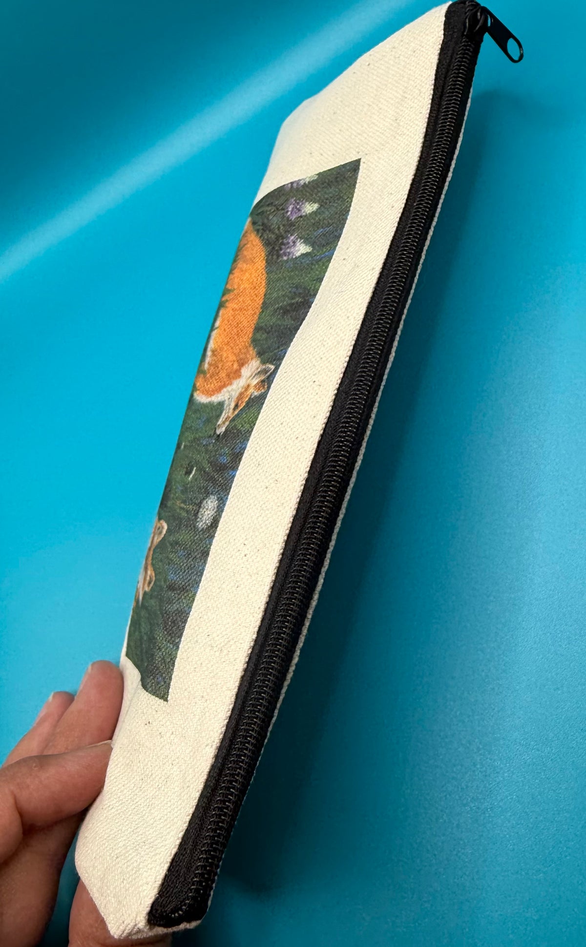 Top view of pencil pouch showing closed zipper 