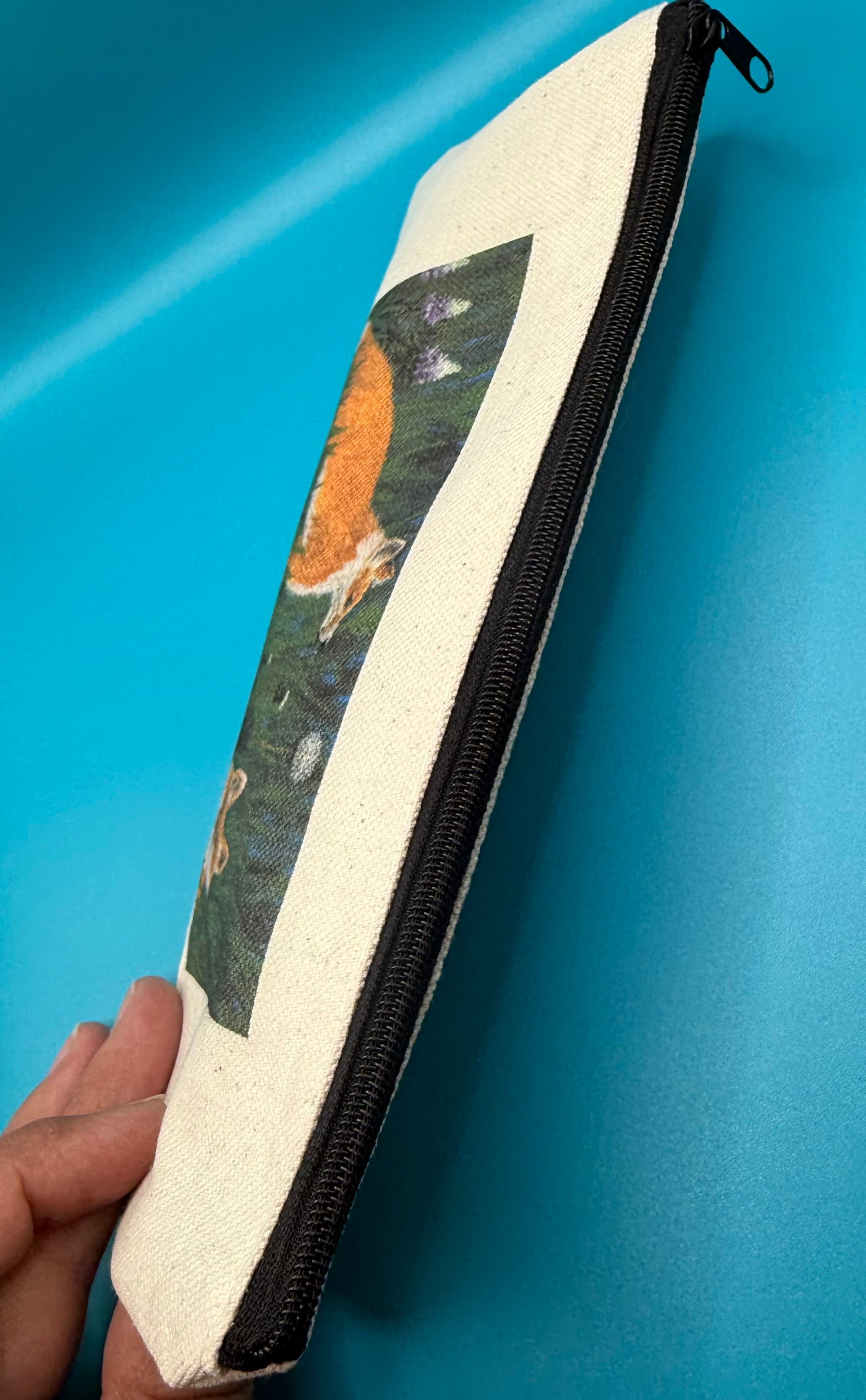 Top view of pencil pouch showing closed zipper 