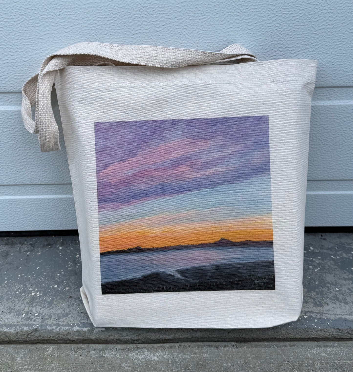 Cotton Canvas tote bag printed with October Sky an original art piece by Theresa Ritter of a sunset in  Alaska